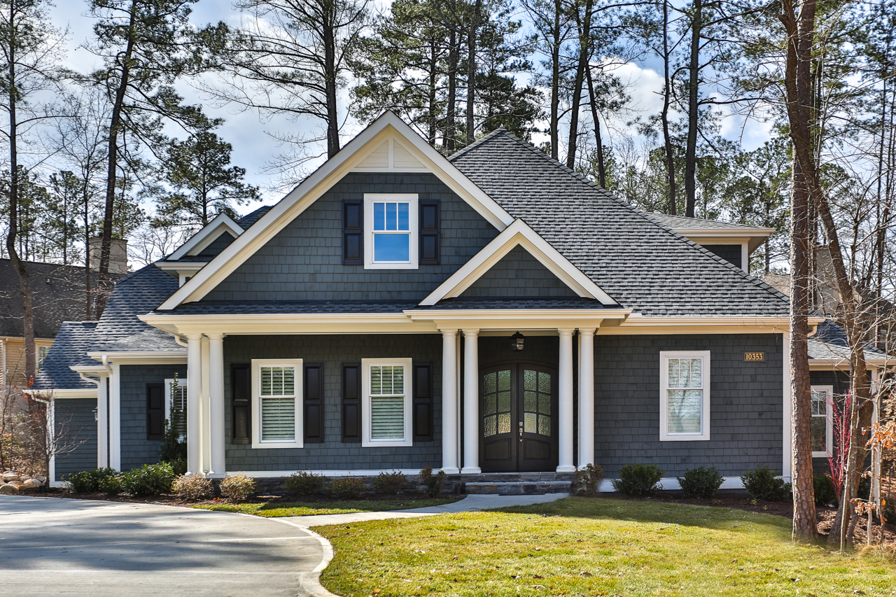exterior of navy, cottage style home